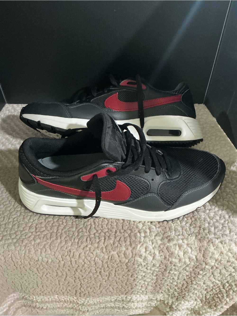 Nike Air Max Black Sneakers with Red Swoosh and White Midsole